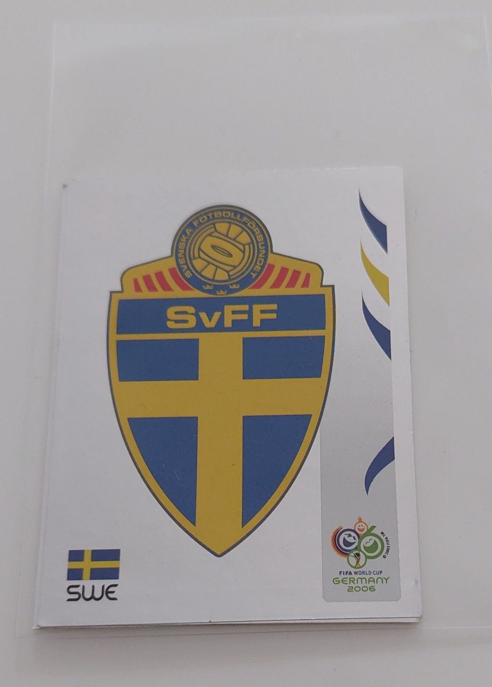Panini Carte collezionabili: Schweder Wappen/Logo Glitzerbild WM 2006 – Usato da Köniz venduto da Toyscollect