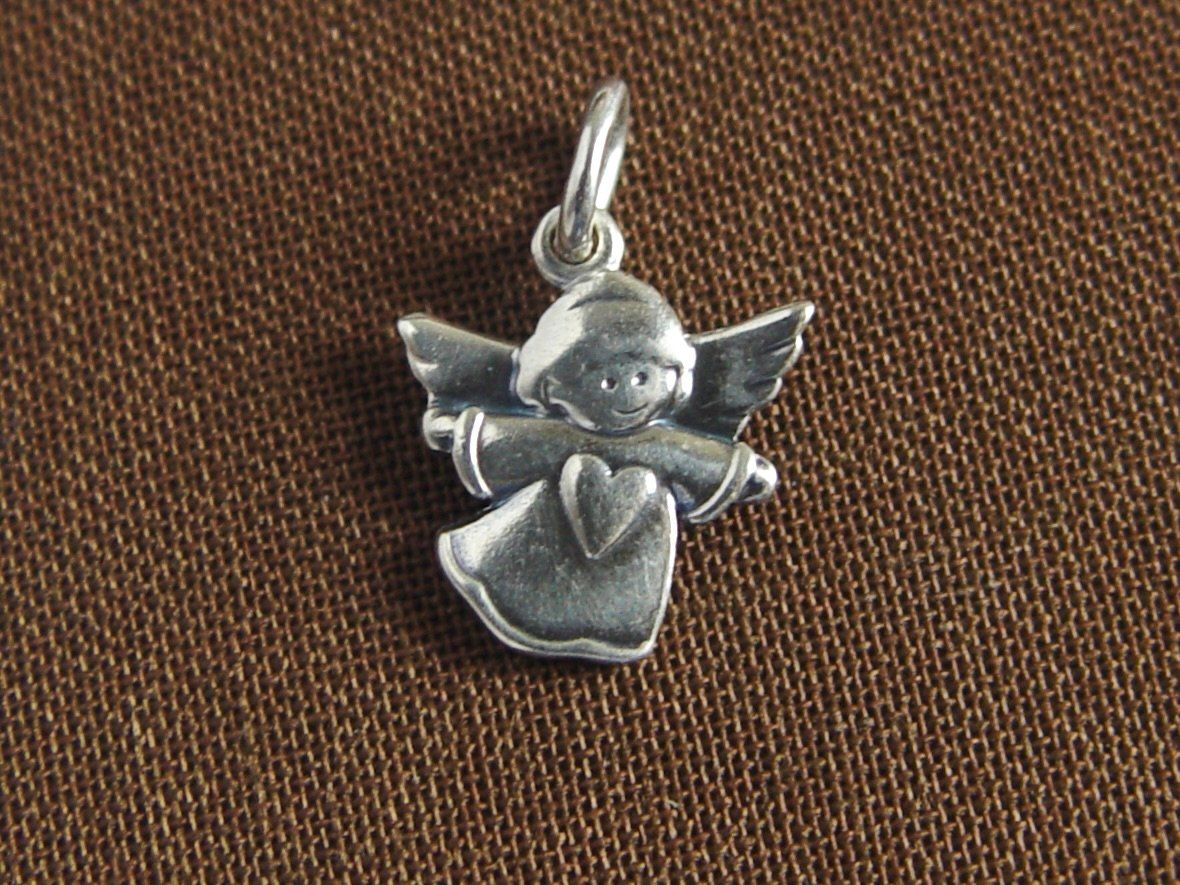 Pendentifs: Kleiner Schutzengel mit Herz, Silber 925 – D'occasion à Henggart par gernli