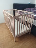 baby cot woth mattress and 2 protectors