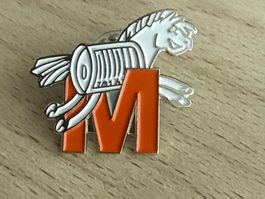 Pin Migros