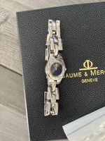 Montre Baume & Mercier femme acier, livrée avec boîte et pap