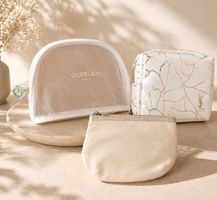 Trio of travel pouches - Guerlin, YSL and Clarins - New!