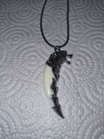 Collier corne tete de loup