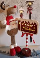 RENTIER MIT BELEUCHTETEM MERRY CHRISTMAS -SCHILD NORDPOLSTYL