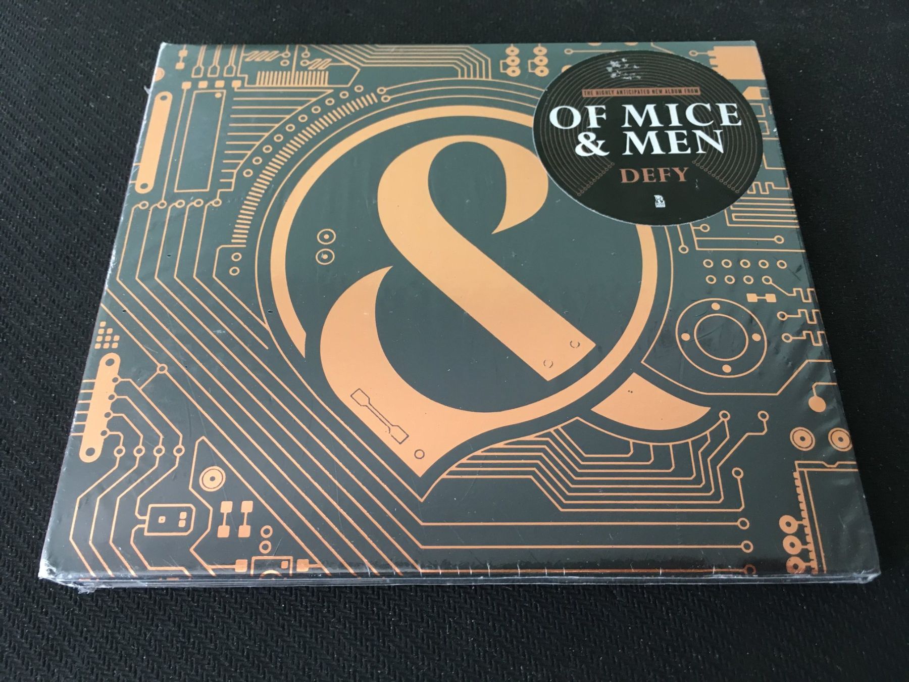 CDs: Of Mice & Men - Defy -CD- Neu/Sealed – Neuf avec emballage d'origine à St.Gallen par MedienJoe