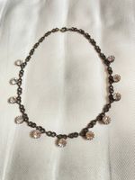 Swarovski Brillanten an bronzefarbener panzermaschiger Kette
