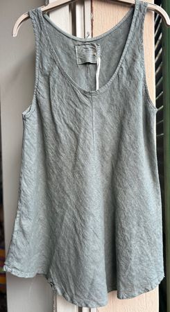 Top in lino, M