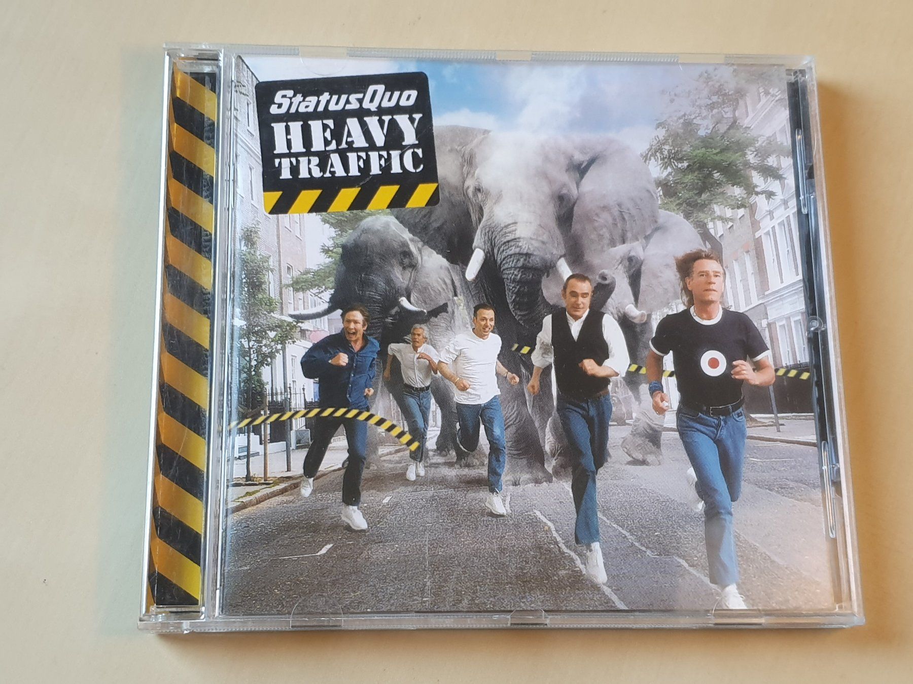CD: Status Quo Heavy Traffic – Usato da Stansstad venduto da collectorsshop