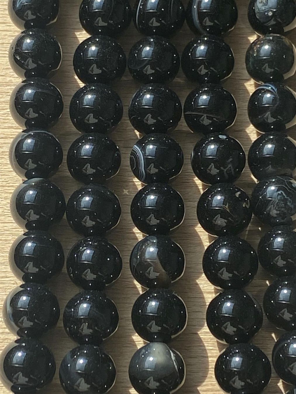 Pietre preziose: Strang echte black striped agate Kugeln / stone beads 8 mm – Nuovo e nell'imballaggio originale da Niederrohrdorf venduto da Ytobi