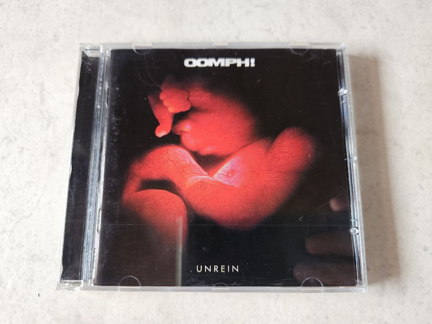 CD: Oomph  -  Unrein – Usato da Schneisingen venduto da backstore24