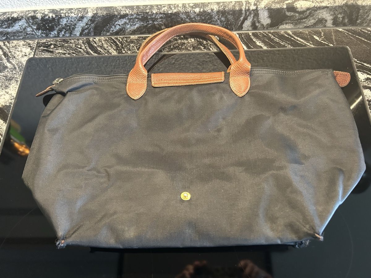 Longchamp Borse da donna: Original Longchamp Le Pliage Grösse M schwarz – Difettoso da Langnau am Albis venduto da SolarisZH 2