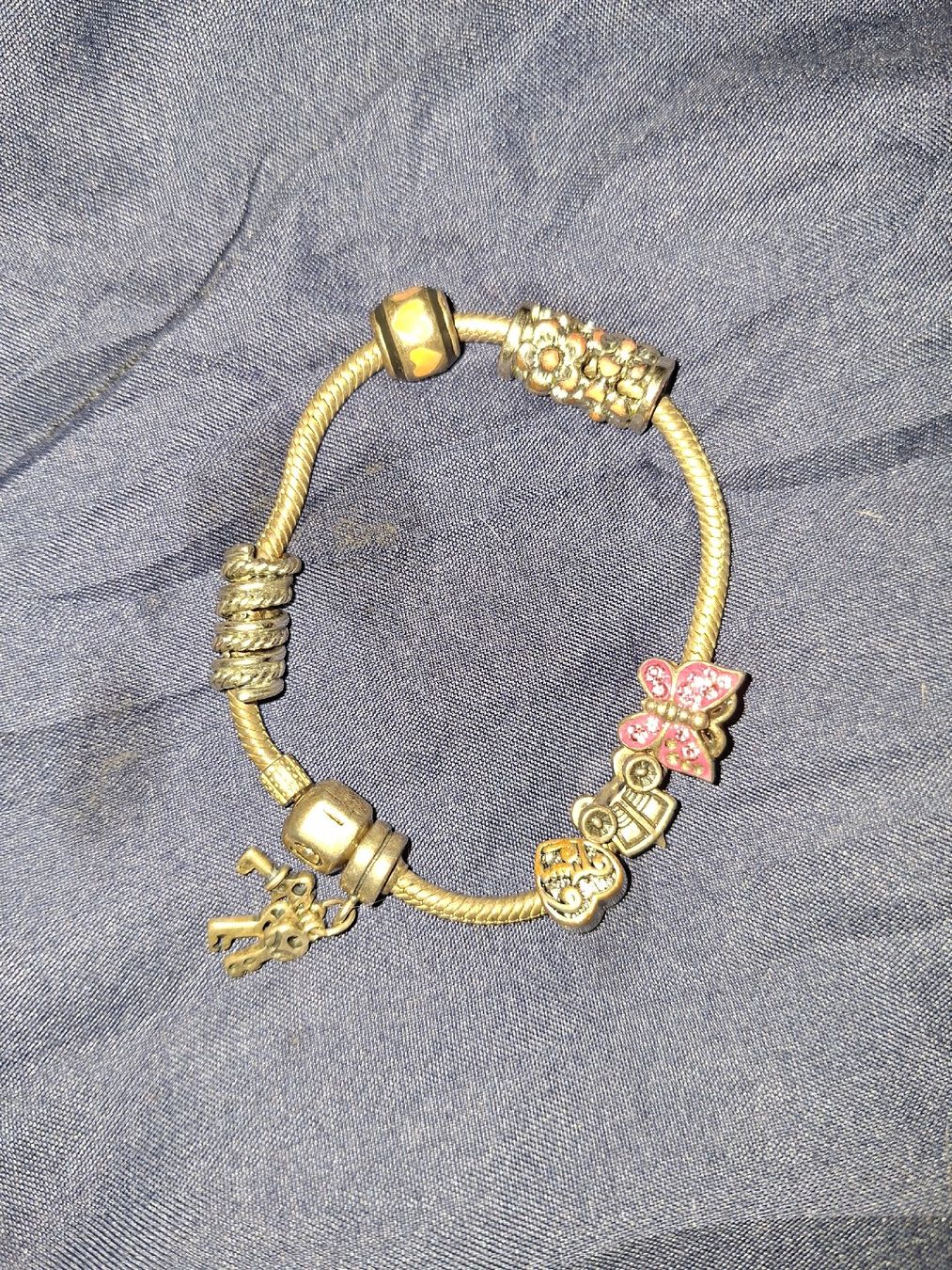 Pandora Bracciali & Braccialetti: Original Pandora Armband mit Charms – Usato da Biel/Bienne venduto da Saalso