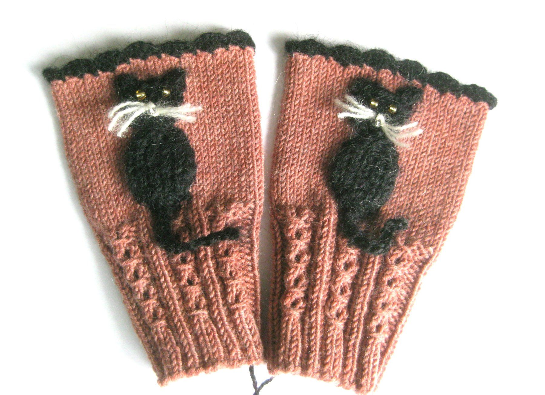 Guanti & manicotti: Pulswärmer mit Katze, handgestrickt – Nuovo (secondo la descrizione) da Kriens venduto da Kraeutergarten