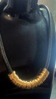Collana con anelli dorati, nuova