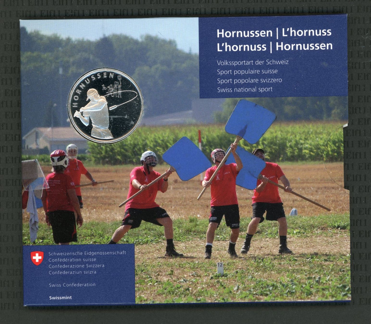 Tutti le monete: CHF__20.00 2015 Hornussen im Folder stgl 20 Franken – Nuovo e nell'imballaggio originale da Widnau venduto da Elf11