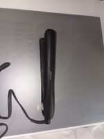 Lisseur GHD couleur noir en bon état général