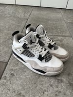 Nike Air Jordan 4 Sneaker weiss schwarz getragener Zustand