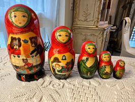 Beautiful gift set of hand painted Russian nestling dolls