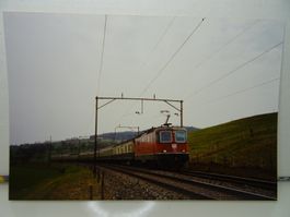 Foto SBB Re 4/4" mit DB Wagen München -Zürich Gossau 02.1992