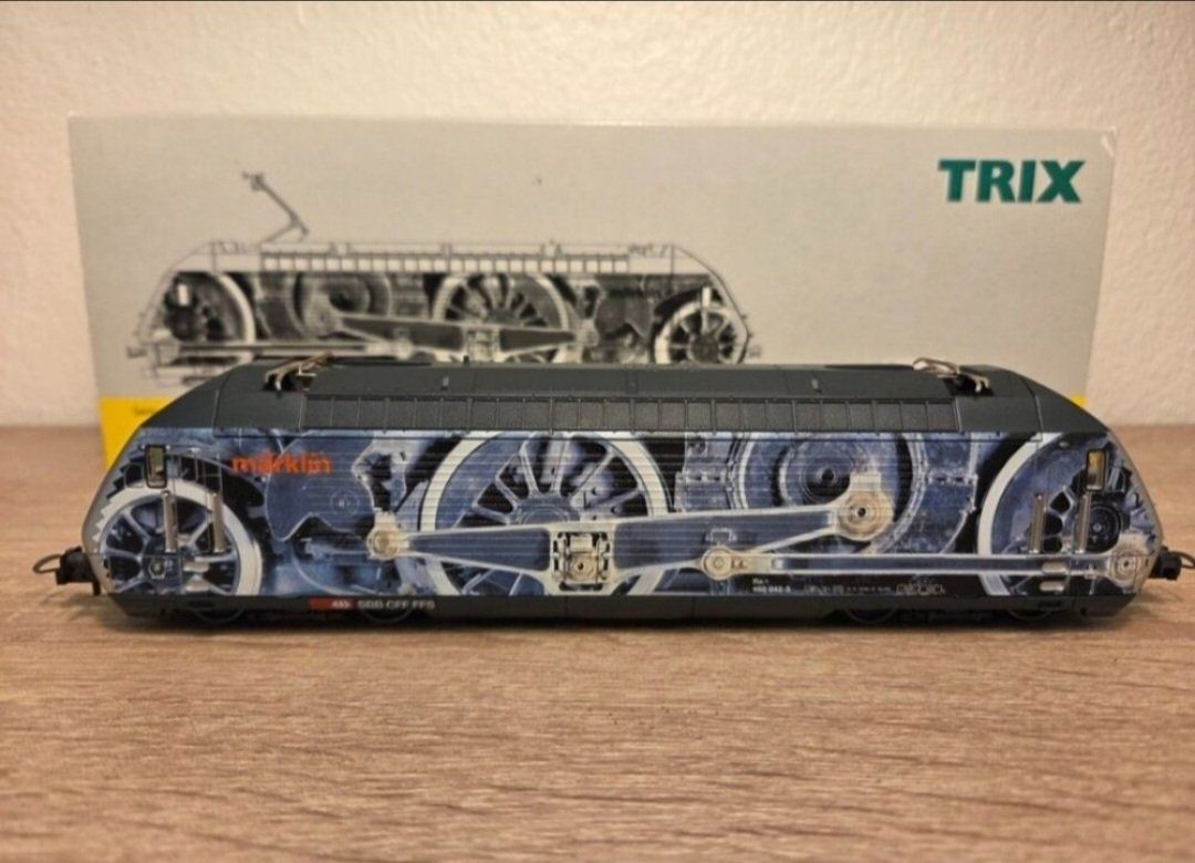Trix Modellini di ferrovie: Trix 22726 E-Lok Re 460 "Industrie" SBB H0 – Nuovo e nell'imballaggio originale da St-Aubin-Sauges venduto da Lo_Go