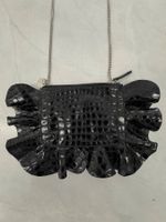 Sac neuf en cuir noir Red Valentino