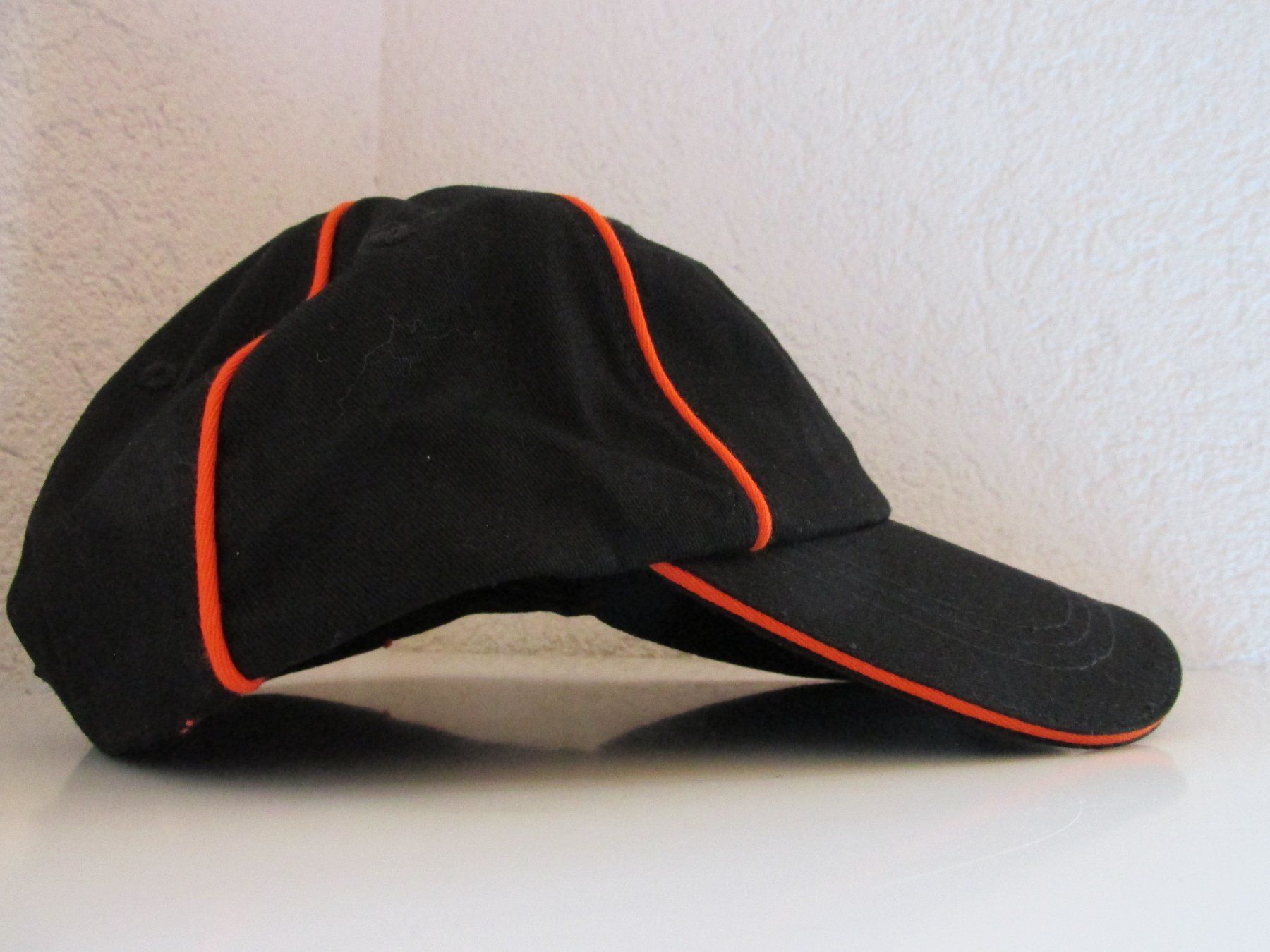 Autres vêtements & accessoires: Cape Coop schwarz orange NEU – Neuf avec emballage d'origine à Aeschau par Nianho 2