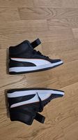 Puma High-Top Sneaker  Schwarz/Weiß mit orangenen Akzenten