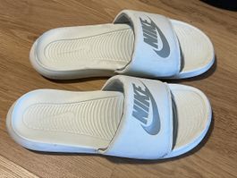 White Nike Slides