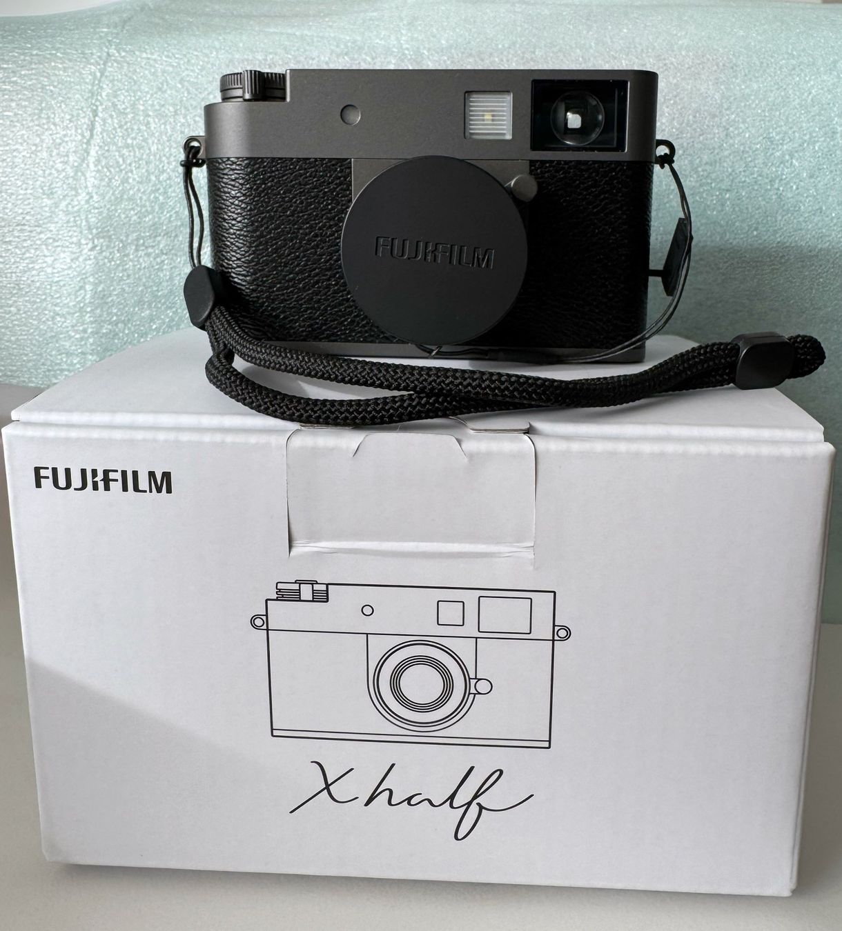 Fujifilm Fotocamera: Fujifilm X Half Charcoal Silver Anthracite, open box – Nuovo e nell'imballaggio originale da Luzern venduto da good.dog