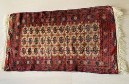 Orientteppich rot beige mit Fransen gebrauchter Zustand