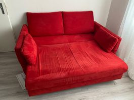Schlafsofa rot mit Bettfunktion gebraucht. 