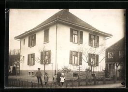 Burgdorf, Häuseransicht mit Anwohnern