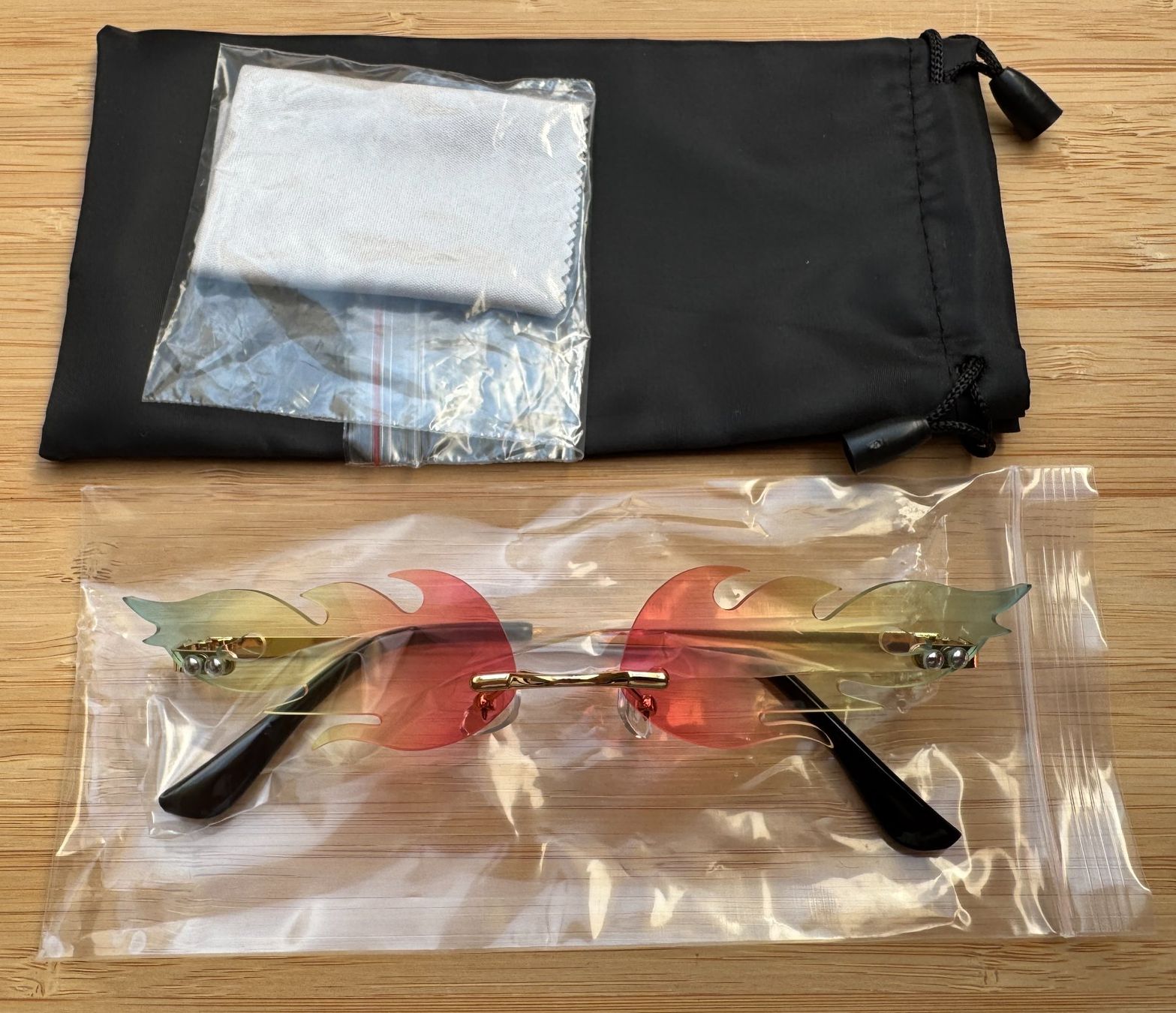 Occhiali & Lenti: Candy Flame Brille, Gadget, Meme Glasses, Rot, Orange, Blau – Nuovo e nell'imballaggio originale da Winterthur venduto da YaV