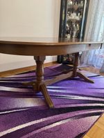 Table de salle à manger ovale en bois état correct
