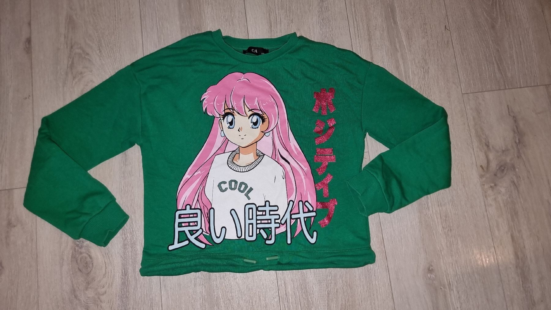 Maglioni & Felpe: Pulli mit Anime Manga Print, Grün, 134 140 – Usato da Wigoltingen venduto da Zuckerfee84