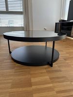 Moderner runder Couchtisch in Schwarz mit Glasplatte