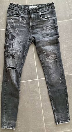 Jeans Zara neri slavati, taglia 38, look usato e di moda