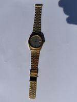 Montre Omega Seamaster Quartz ton or état correct
