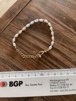 Joli bracelet en perles blanches 15 cm +4,5 cm neuf