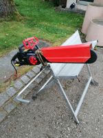 Sägebock mit elektrischer Motorsäge