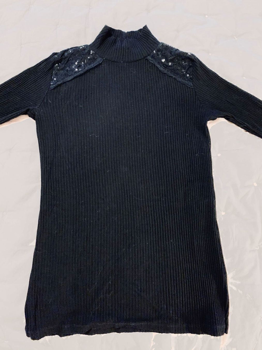 Top: Pull fin noir t.38 – Usato da Sion venduto da DayJenn