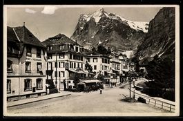 AK Grindelwald, Strassenpartie mit Strasenbahn u. Wetterhorn