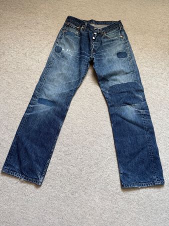 Jeans Levi's 501 usagé et rapiécé