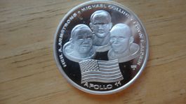 Pièce commémorative Apollo 11 first man on the moon.arg999