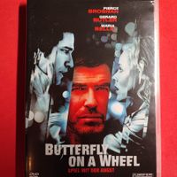 BUTTERFLY ON A WHEEL