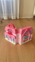 Puppenhaus pink mit Zubehoer gebrauchter Zustand