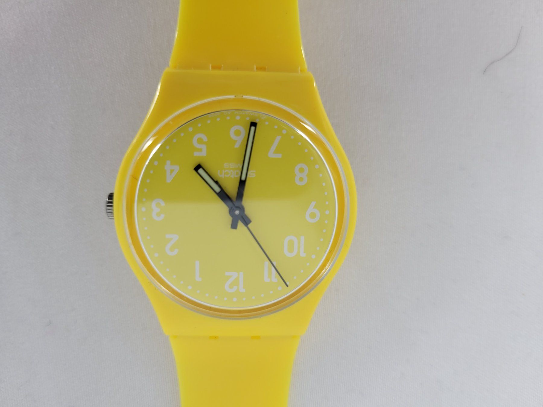 Swatch Uhren: SWATCH Montre jaune année 2009 – Gebraucht aus Lausanne von  2
