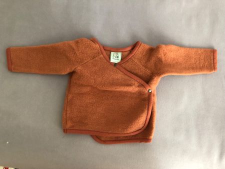 Neuwertiges Jäckchen/Wickelpullover  100% Wolle Gr. 62/68