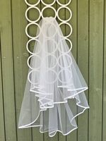 Schleier zu Hochzeitskleid
