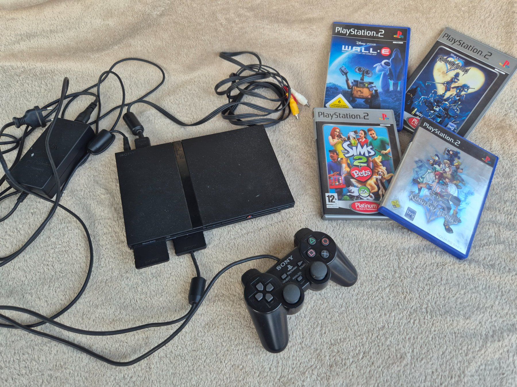 Sony Consoles: Playstation 2 Konsole mit 4 Spielen und Controller – D'occasion à Bellach par Caro29